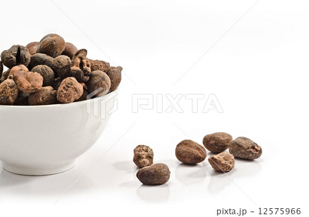 Cup full of shea nuts 12575966