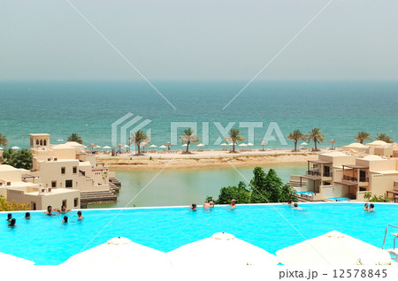 The tourists enjoying their vacation at luxury hotel, Ras Al Khaimah, UAE. 12578845