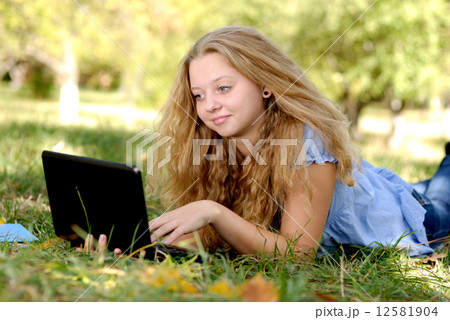 Girl with laptop 12581904
