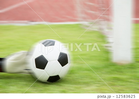 Goalkeeper used hands for catches the ball 12583625