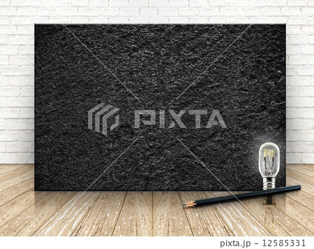 Black stone on the white brick wall and the wood floor,template Black stone on the white brick wall and the wood floor,template 12585331