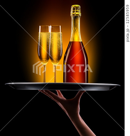 waiter hand with champagne 12585959