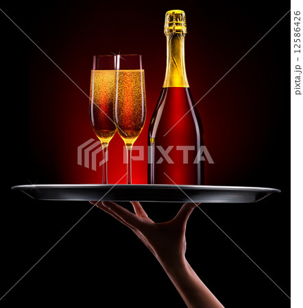 waiter hand with champagne 12586426