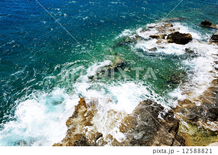 The turquoise water at shore of Spinalonga Island, Crete, Greece The turquoise water at shore of Spinalonga Island, Crete, Greece 12588821
