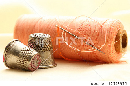 Thread bobbins and sewing thimbles 12593956