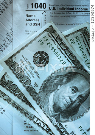 Budget, tax form and dollar 12593974