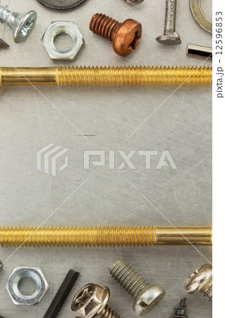 hardware tools at metal background hardware tools at metal background 12596853