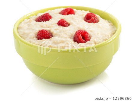 bowl of oatmeal  on white 12596860