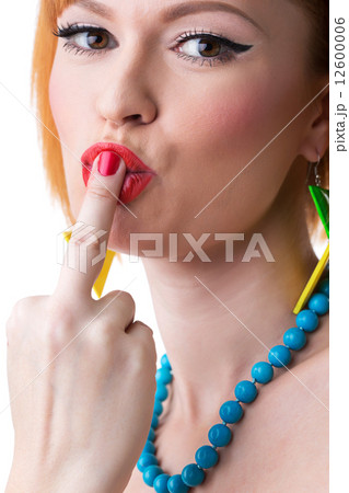 Portrait of cute pin-up girl posing at camera 12600006