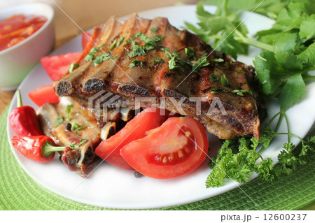 Delicious BBQ ribs with herbs Delicious BBQ ribs with herbs 12600237