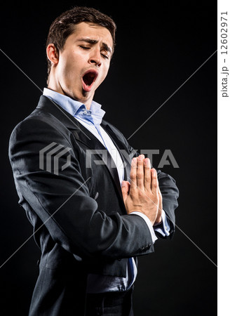 Opera singer performing over black background 12602971