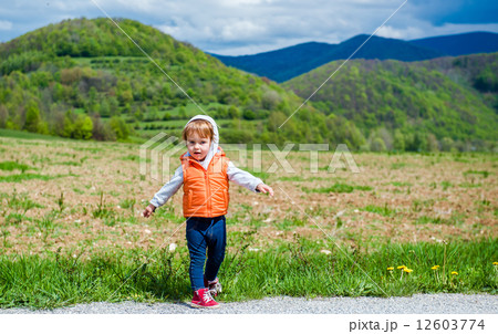 Adorable baby girl outdoors Adorable baby girl outdoors 12603774