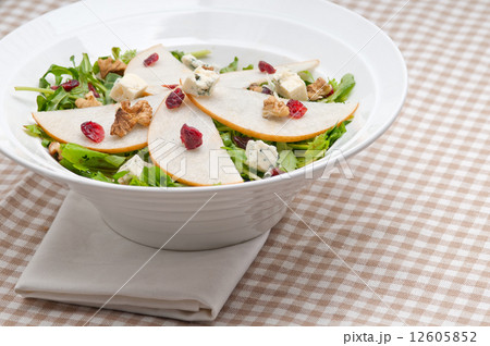 Fresh pears arugula gorgonzola cheese salad Fresh pears arugula gorgonzola cheese salad 12605852