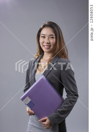 Business woman with a file 12608053