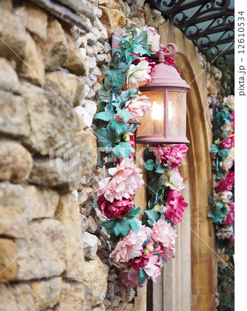 ピンクの花飾り 12610534