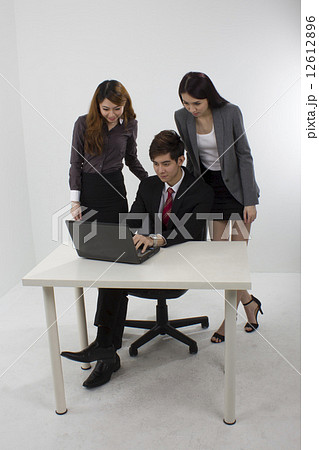 Business person using laptop Business person using laptop 12612896