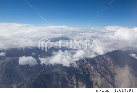 Himalaya mountains under clouds Himalaya mountains under clouds 12618593