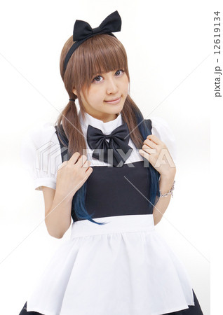 メイド服を着たかわいい女性の写真素材