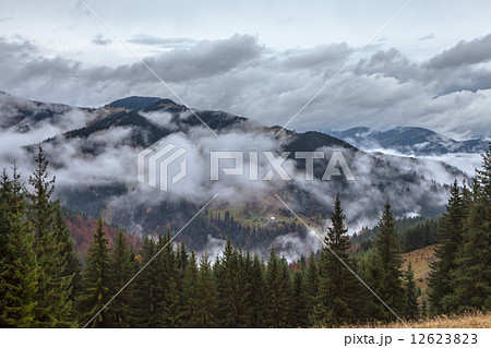 global warming. mountain landscape. Clouds and fog global warming. mountain landscape. Clouds and fog 12623823