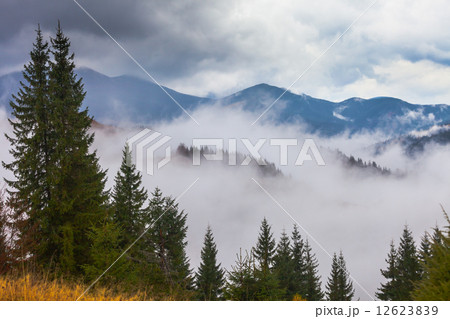 global warming. mountain landscape. Clouds and fog global warming. mountain landscape. Clouds and fog 12623839
