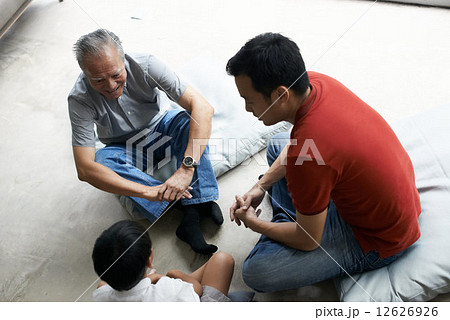Three Generations of Men - Sitting on Floor Three Generations of Men - Sitting on Floor 12626926