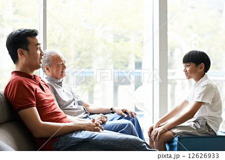 Three Generations of Men - Sitting on Couch 12626933
