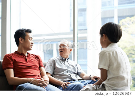 Three Generations of Men - Sitting on Couch 12626937