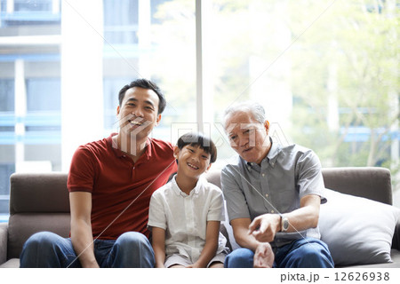 Three Generations of Men - Sitting on Couch 12626938