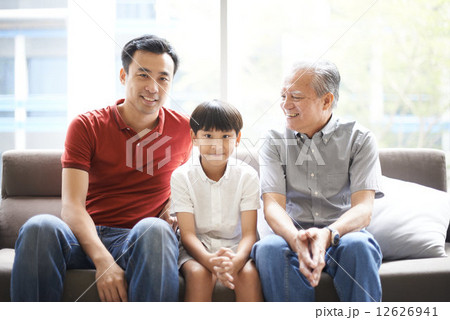 Three Generations of Men - Sitting on Couch 12626941
