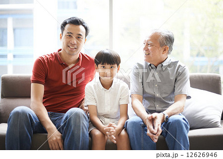 Three Generations of Men - Sitting on Couch 12626946