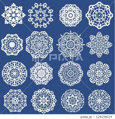 Set of Decorative paper snowflakes. White on blue background 12628624
