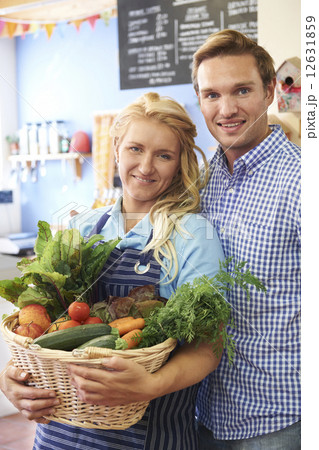 Portrait Of Couple Running Organic Food Shop Portrait Of Couple Running Organic Food Shop 12631859