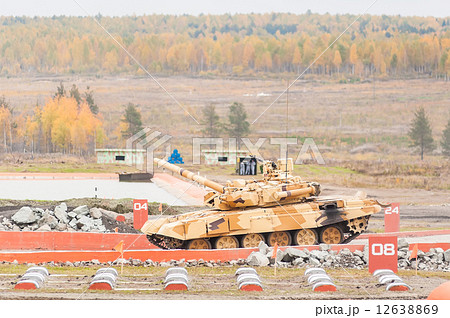 Modernized tank T-90S in action Modernized tank T-90S in action 12638869
