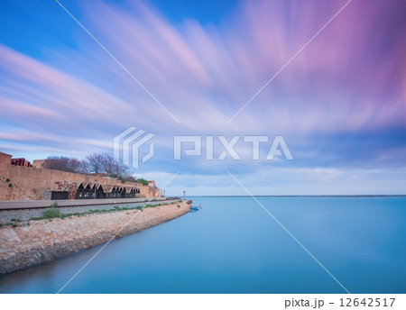 Landscape of the old town of Faro in Portugal. With moving sky. Landscape of the old town of Faro in Portugal. With moving sky. 12642517