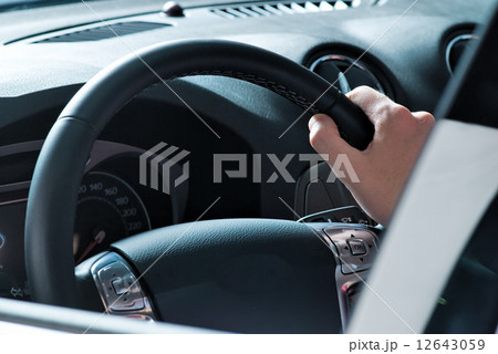 Driving man Driving man 12643059