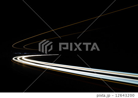 Car light trails in the tunnel. 12643200