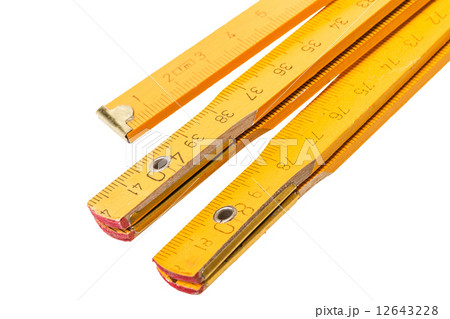 Folding ruler isolated Folding ruler isolated 12643228