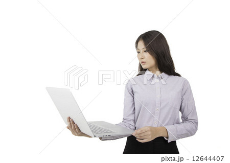 Lady holding a laptop 12644407