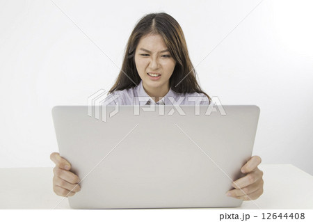 Disgusted lady grabing LCD screen Disgusted lady grabing LCD screen 12644408