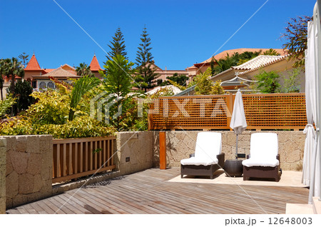 Sunbeds at the outdoor of luxury villa, Tenerife island, Spain Sunbeds at the outdoor of luxury villa, Tenerife island, Spain 12648003