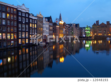 Buildings on canal in Amsterdam, Netherlands Buildings on canal in Amsterdam, Netherlands 12648193