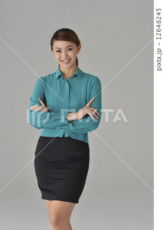 an confident asian office lady smiling an confident asian office lady smiling 12648245