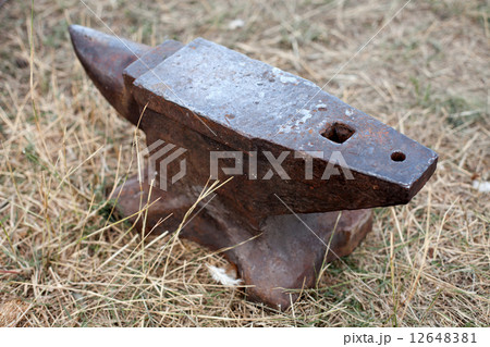 old blacksmith anvil standing on the ground 12648381