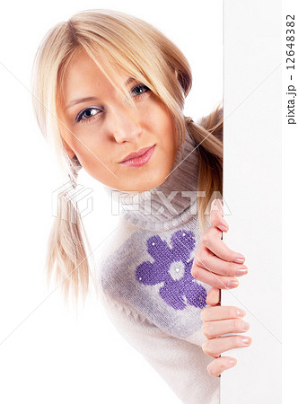 Woman beside whiteboard 12648382