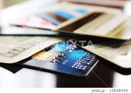 Credit cards and banknote (macro) 12648459