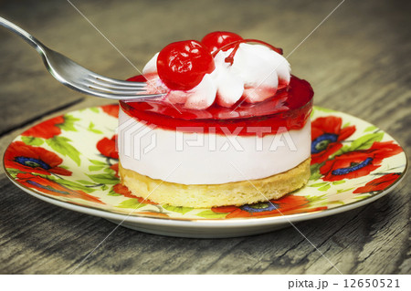 Cherry cake on a plate  12650521
