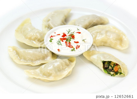 Nepalese food momo on a white background in the restaurant Nepalese food momo on a white background in the restaurant 12652661