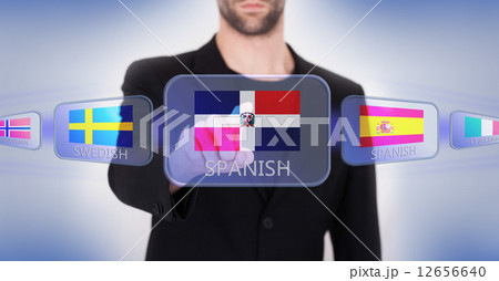 Hand pushing on a touch screen interface Hand pushing on a touch screen interface 12656640