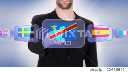 Hand pushing on a touch screen interface Hand pushing on a touch screen interface 12656642