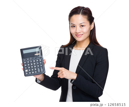 Businesswoman finger point up calculator Businesswoman finger point up calculator 12658515